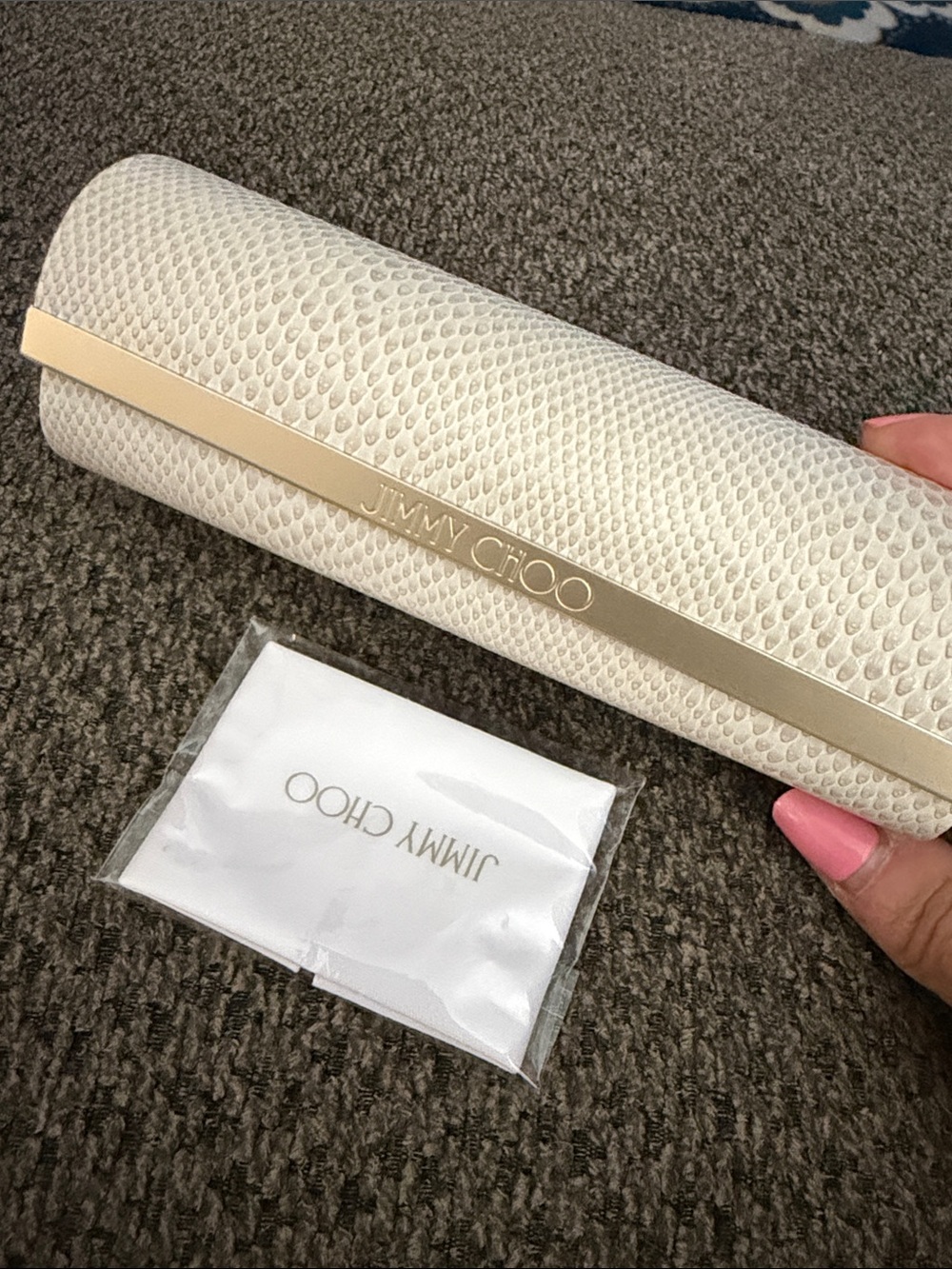 Jimmy Choo White Textured Hard Clutch with Gold Trim and cleaning cloth